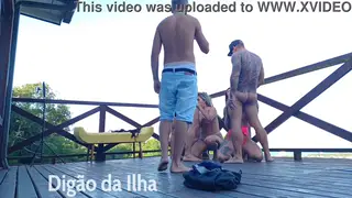 Redhead Handles Multiple Cocks in Balcony Orgy