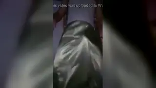 Cross-Dresser Sways in Shimmering Satin Fabric