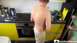 Voluptuous Redhead Takes Kitchen Counter Doggystyle