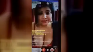 Busty Babe Flaunts Her Curves in a Live Nude Show