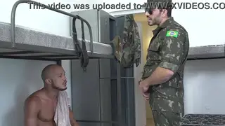 Muscular Bear Drills Recruit Bareback in Military Gym