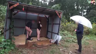 Busty Asian MILF Shares Two Cocks in Outdoor Threesome