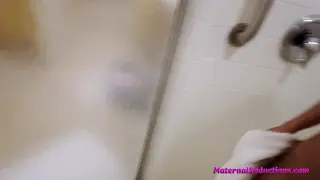 Stepmom Sucks Cock in the Shower While Stuck