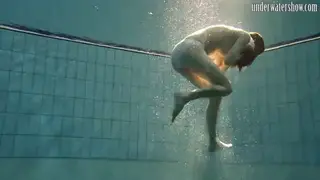 Busty European Teen Sheds Lingerie Underwater