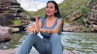 Brunette Takes Her Lover Deep in a Flowing River