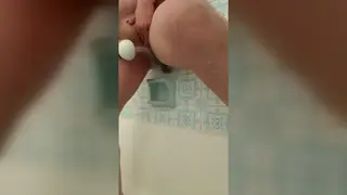 Teen Enjoys Toy Play During Steamy Shower Solo