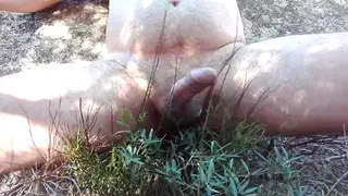 Outdoor Bondage Massage Ends With Toy Play and Cumshot