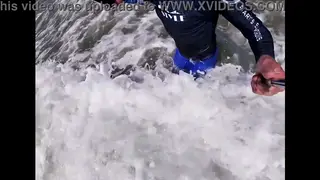 Latino Jock Flashes Wet Spandex Bulge on Public Beach