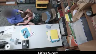 Uniformed Officer Bends Shoplifter Teen Over Desk