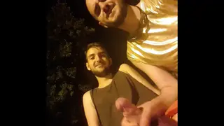 Two Men Share a Steamy Blowjob at a Pride Festival