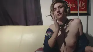 Petite Teen Smokes Topless With Headphones On