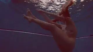Polish Teen Strips Nude for Underwater Pool Tease