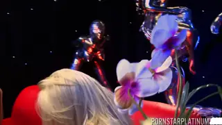 Blonde Women Share Passionate Kisses and Oral Pleasure at Club