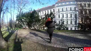 Busty Redhead Handles Multiple Partners in Holiday Gangbang