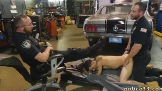 Muscular Police Trio Engages in Interracial Threesome