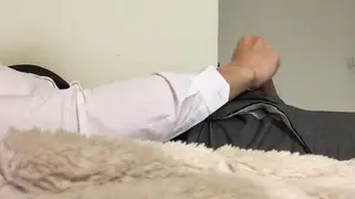 Suited Guy Works a Handjob in Uniform
