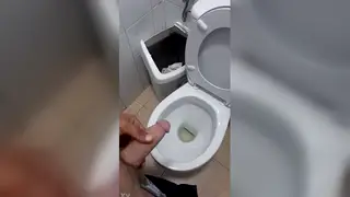 Office Worker Strokes and Pisses at His Desk
