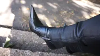 Amateur Shows Off Boots and Leather Pants Outdoors