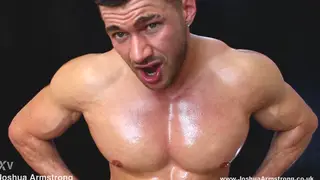 Muscular Hunk Strokes Oiled Cock in Leather