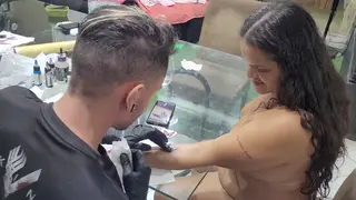 Tattooed Woman Teases in a Solo Amateur Clip