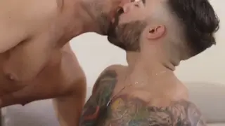 Muscular Latino Doctor Examines Patient in Hospital Office