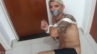 Bound Man Endures Intense BDSM Session