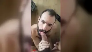 Hairy Stud Takes Oral Load on Camera