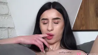 Tattooed Brunette Pleasures Herself With Toy on Couch