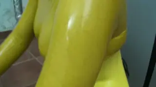 Blonde Bound in Yellow Latex Enjoys Self Bondage