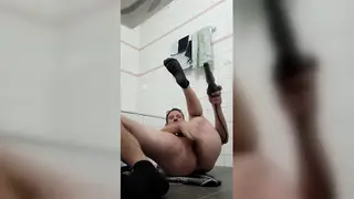 European Guy Stretches With Inflatable Plug While Friends Roam