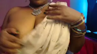 Indian MILF Teases Her Feet and Big Tits on Webcam