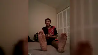 Solo Guy Wiggles Bare Feet for the Camera