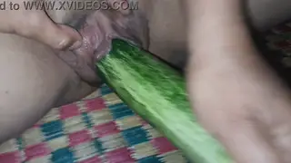 Teacher Masturbates with Cucumber at Classroom Desk