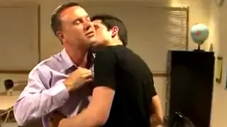 Mature Teacher Takes a Young Student Over the Desk