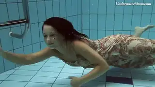 Busty European Teen Shows Off Natural Tits by the Pool