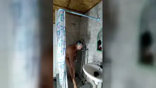 Busty Housewife Pleasures Herself Under Steamy Shower