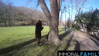 Busty Brunette Takes a Threesome Outdoors in Public
