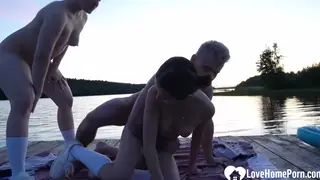 Outdoor Threesome Blends Massage and Rough Sex