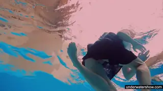 Redhead Teen Enjoys Solo Poolside Play