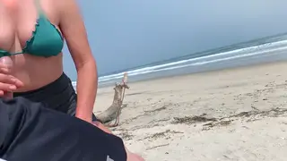Voluptuous Stranger Strokes Stranger on Crowded Beach