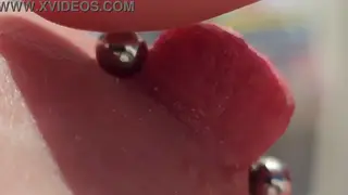 European MILF Plays Pierced Nipples on Balcony