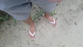 Redhead Latina Gives Risky Handjob on Public Beach