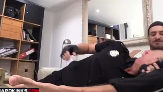 Leather-Clad Cop Dominates Submissive in Bondage Session