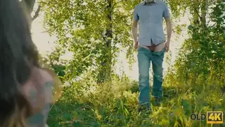Busty European Teen Sucks an Older Man Outdoors