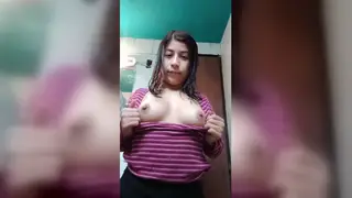 Petite Latina Shows Off Her Ink and Piercings in a Solo Tease