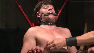 Muscular Gymnast Endures Bondage Challenge with Toys