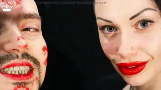 Redhead Domme Marks His Face With Lipstick Kisses