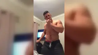 Muscular Hunk Flexes and Strips in Gym Showcase