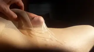 Muscular Guy Shoots Load in Sheer Stockings