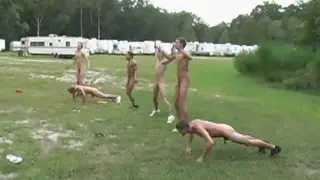Coach Supervises Naked Twinks During Outdoor Blowjob Session